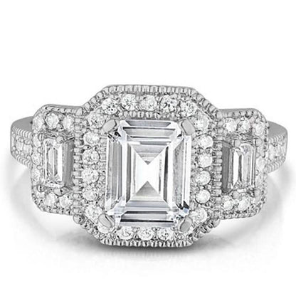 18k White Gold Tri Stone Emerald Cut Cubic Zirconia Ring