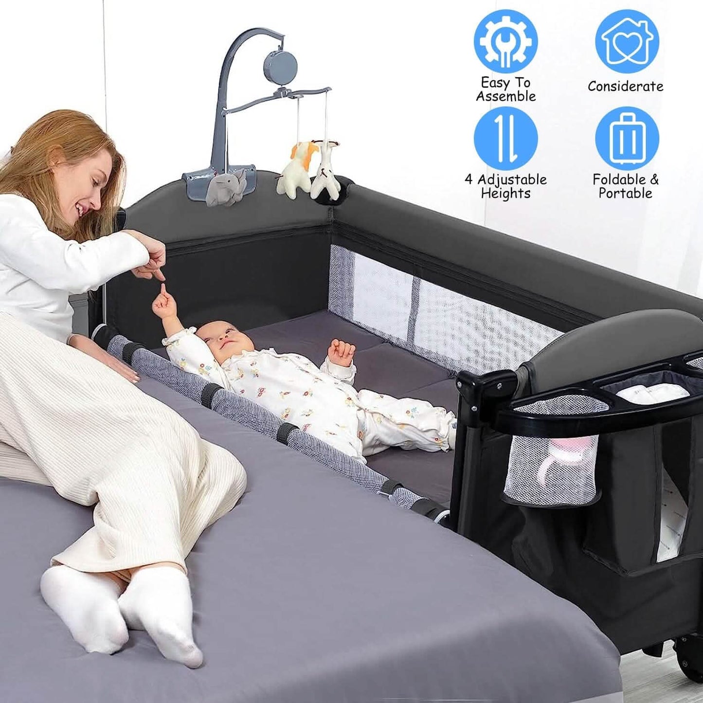 6-in-1 Foldable Baby Crib with Activity Center Diaper Changing Table