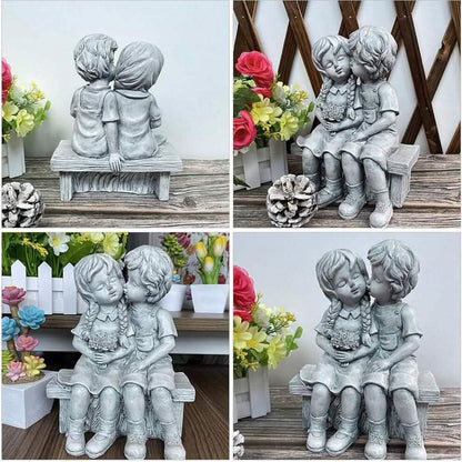Boy Kissing Girl Statue Sitting on Bench Figurine
