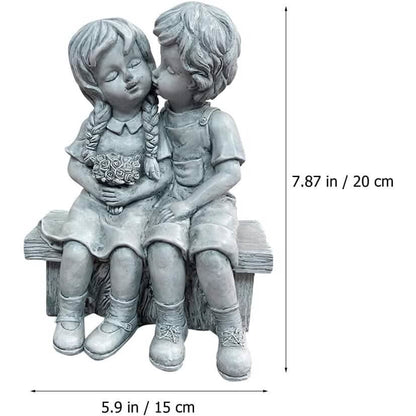 Boy Kissing Girl Statue Sitting on Bench Figurine