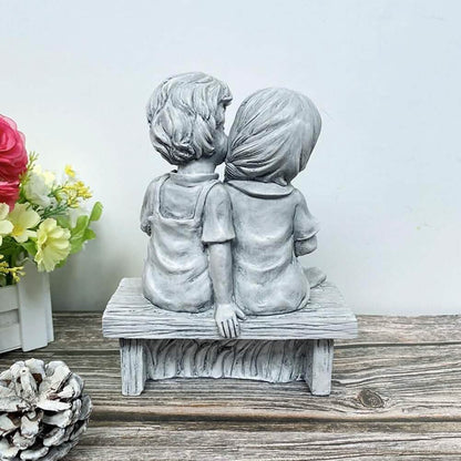 Boy Kissing Girl Statue Sitting on Bench Figurine
