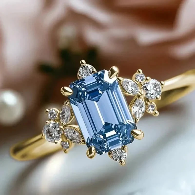Elegant Gold-Plated Copper Engagement Ring with Square Blue Cubic Zirconia