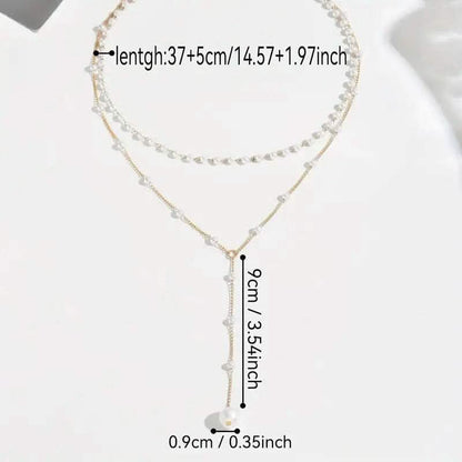 Elegant Vintage Style Double-Layer Pendant Necklace with Imitation Pearl Accents and Tassel Drop