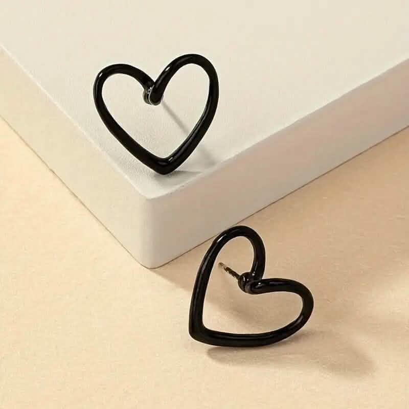 Glossy Hollow Heart Design Stud Earrings