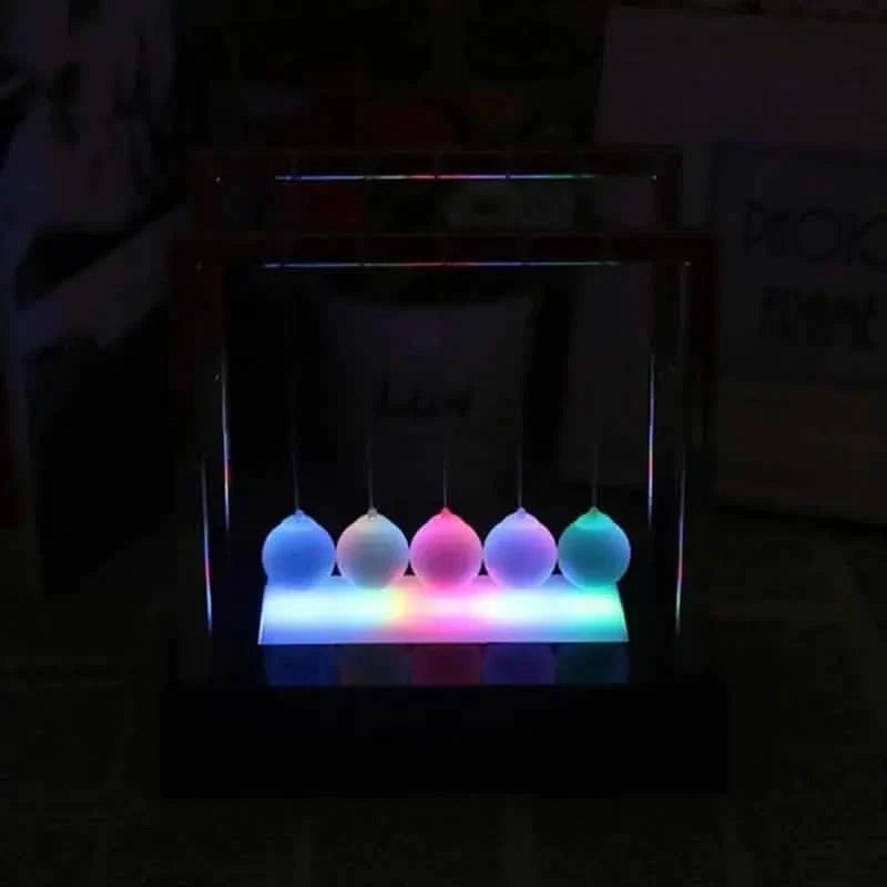 LED Light Up Pendulum Perpetual Fun Science Physics Learning Balance Balls Desk Toys