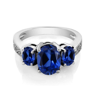 Oval Cut Tri Stone Blue Topaz Ring - Assorted Sizes