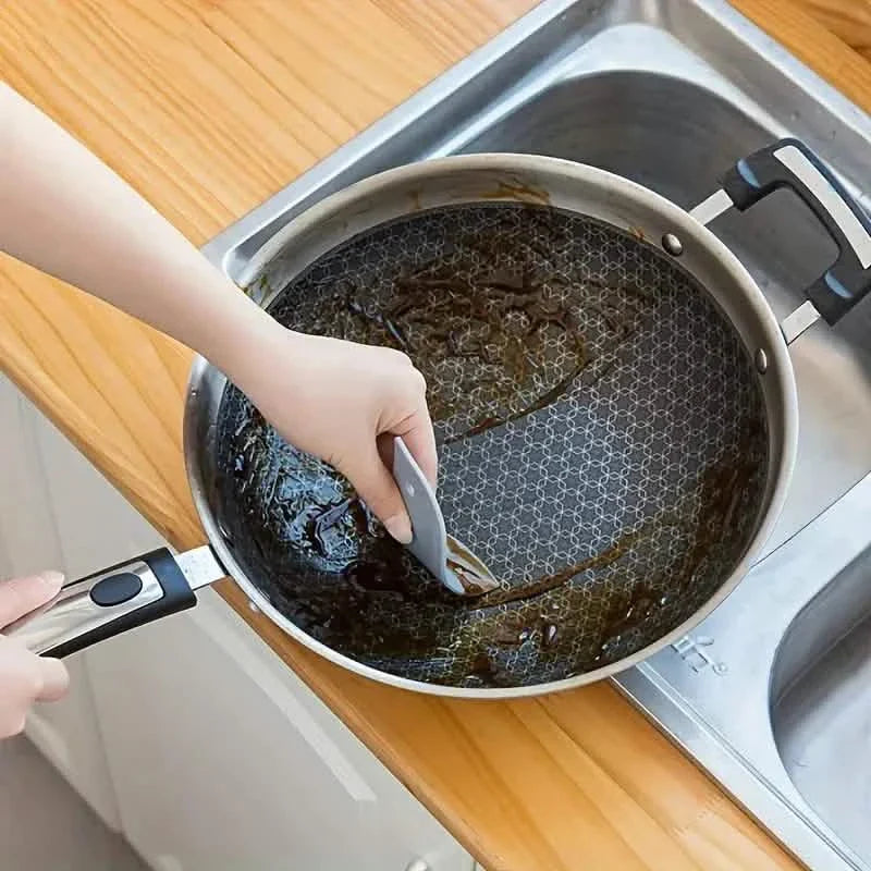 Penguin-shaped Soft Kitchen Stain Scraper Tool